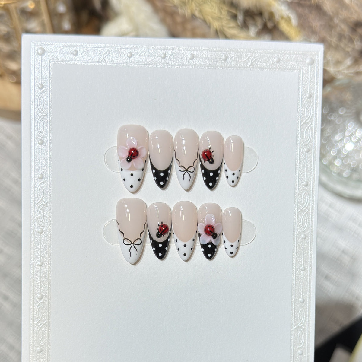 Artistic Stiletto Press-On Nail Set with Floral and Insect Designs Acalora