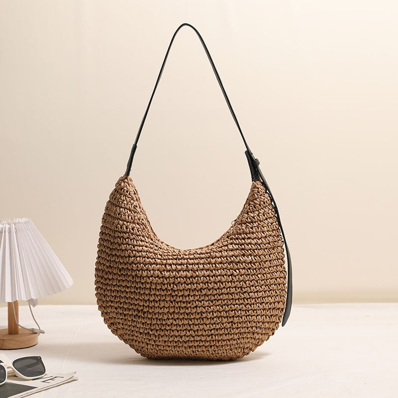 Women's Handmade Shoulder Bag made of braided natural material with a narrow leather strap Karnz