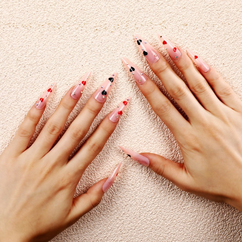 Glamorous artificial nails with heart accents Acalora