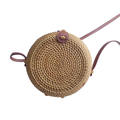 Women's round basket bag with unique ceramic detail Brehn