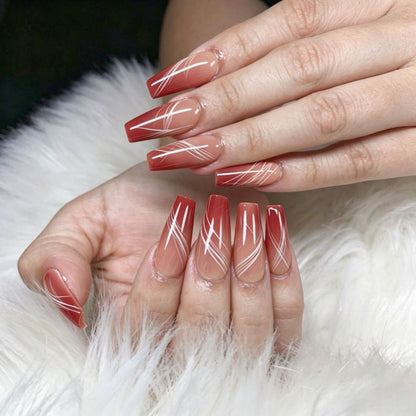 Artificial nails in elegant ombre design with fine lines Acalora