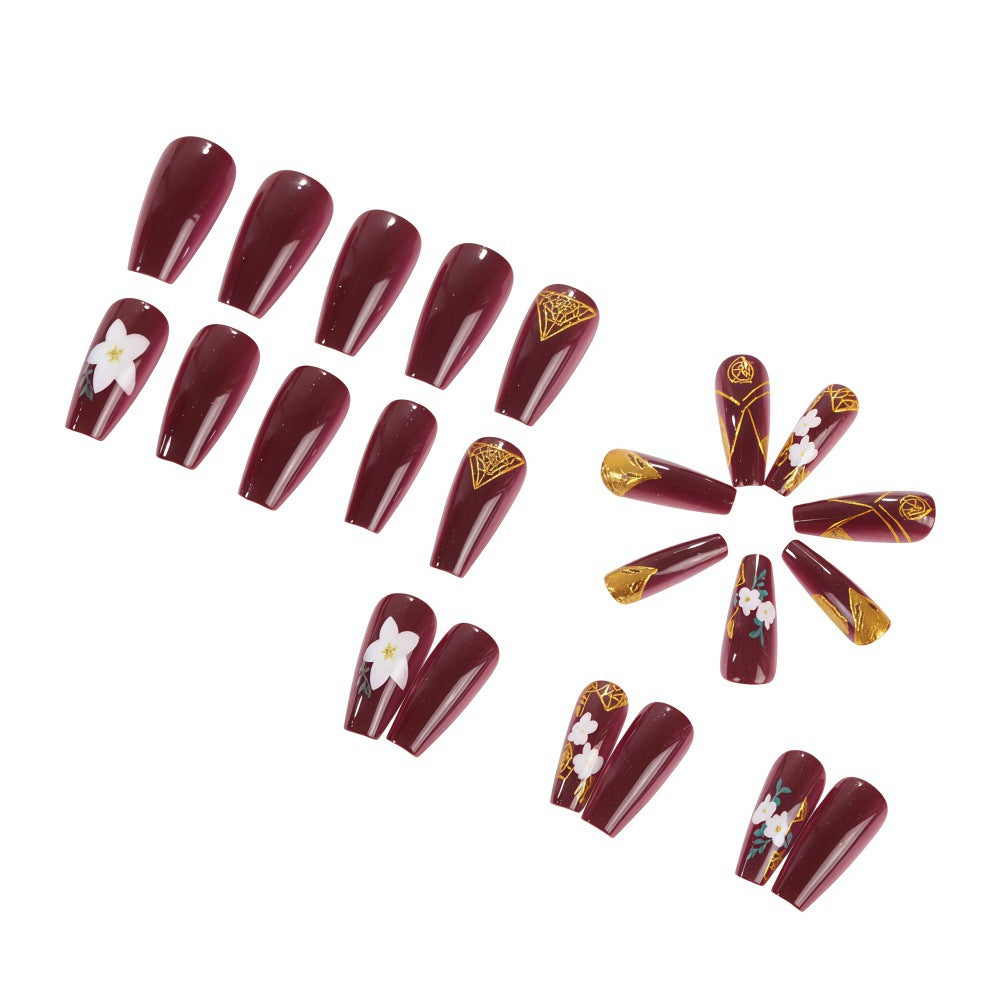 Trendy artificial nails with floral accents Acalora