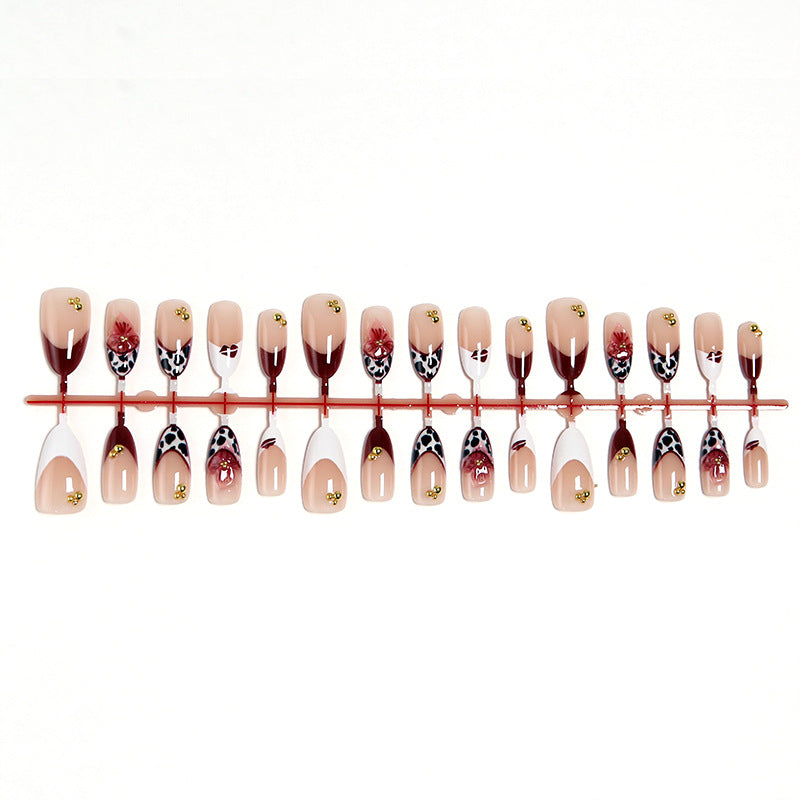 Artificial nail set with elegant floral patterns and glamorous details Acalora