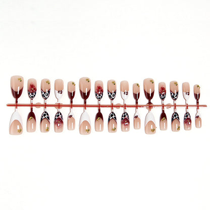 Artificial nail set with elegant floral patterns and glamorous details Acalora