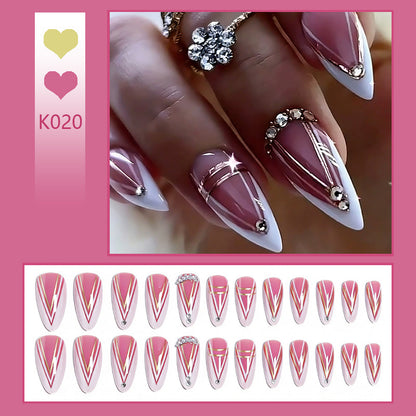 Acrylic nail set with elegant stiletto shape and luxurious embellishments Acalora