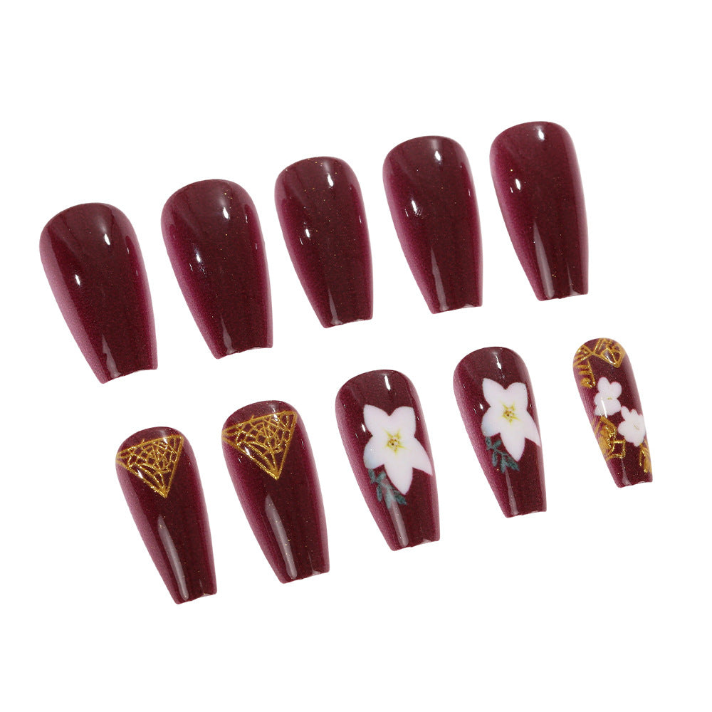 Trendy artificial nails with floral accents Acalora