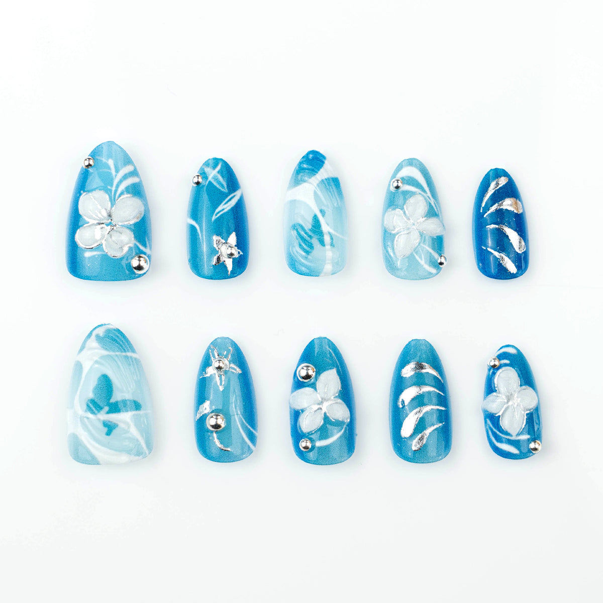 Artificial nail set with floral accents and elegant glitter elements Acalora