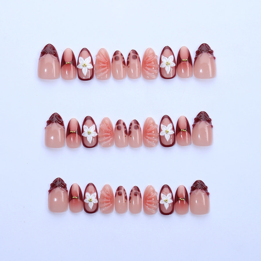Artificial nail set with floral 3D applications and elegant gradient design Acalora