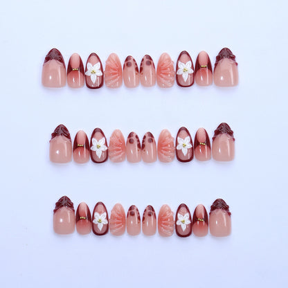 Artificial nail set with floral 3D applications and elegant gradient design Acalora