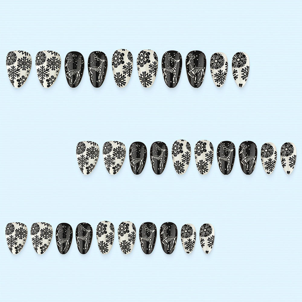Artificial nails in a unique winter design with snow and reindeer motifs Acalora