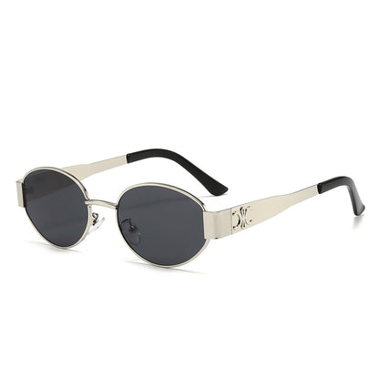 Women's designer sunglasses with elegant oval frame and unique accents Bowlift