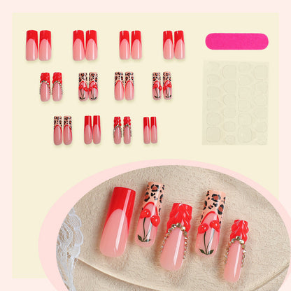 Artistic Long Press-On Nail Extensions with Decorative Accents Acalora