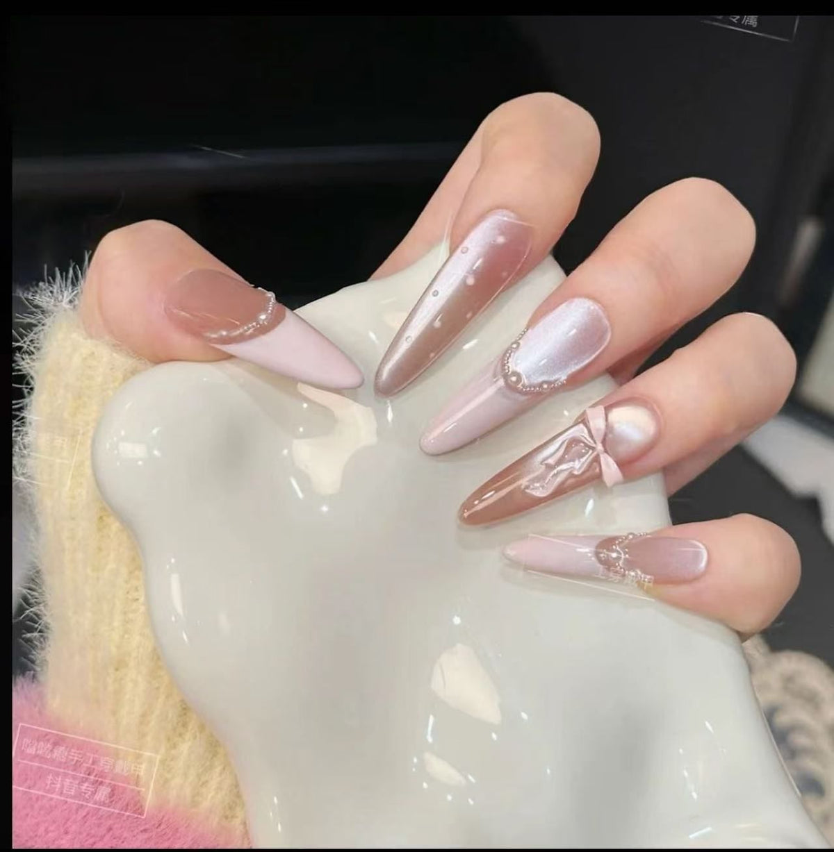 Glamorous artificial nail tips with elegant decorations Acalora