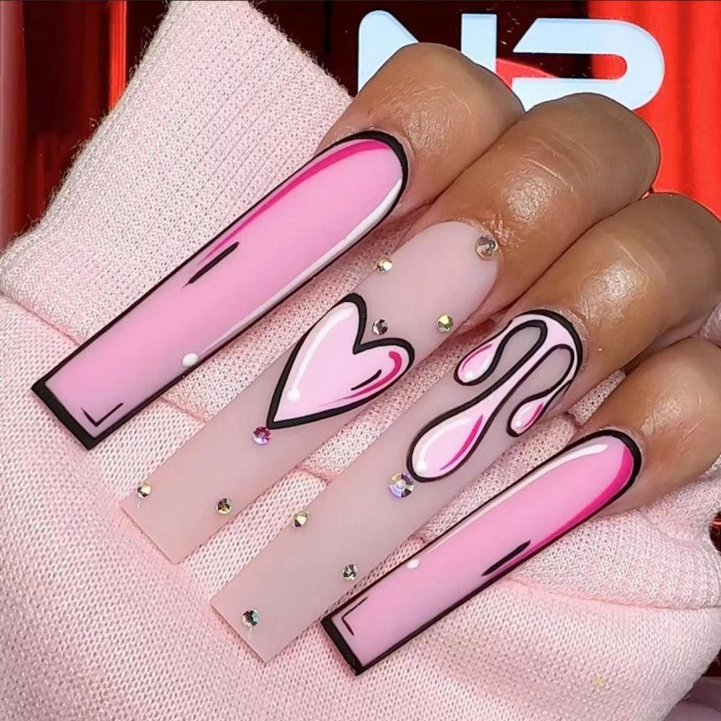 Eye-catching artificial nails with soulful heart design and glamorous accents Acalora