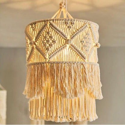 Macrame plant hanger with decorative fringes
