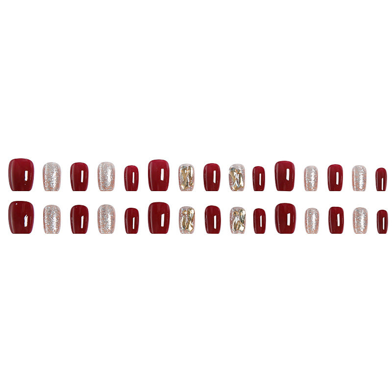 Artificial nail set with elegant glitter and metallic accents Acalora