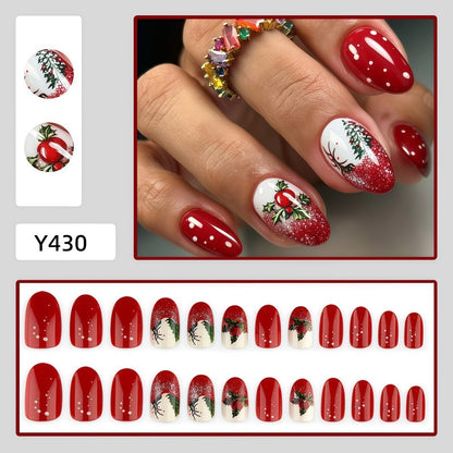 Christmas art nails with festive glitter pattern and Christmas motifs Acalora