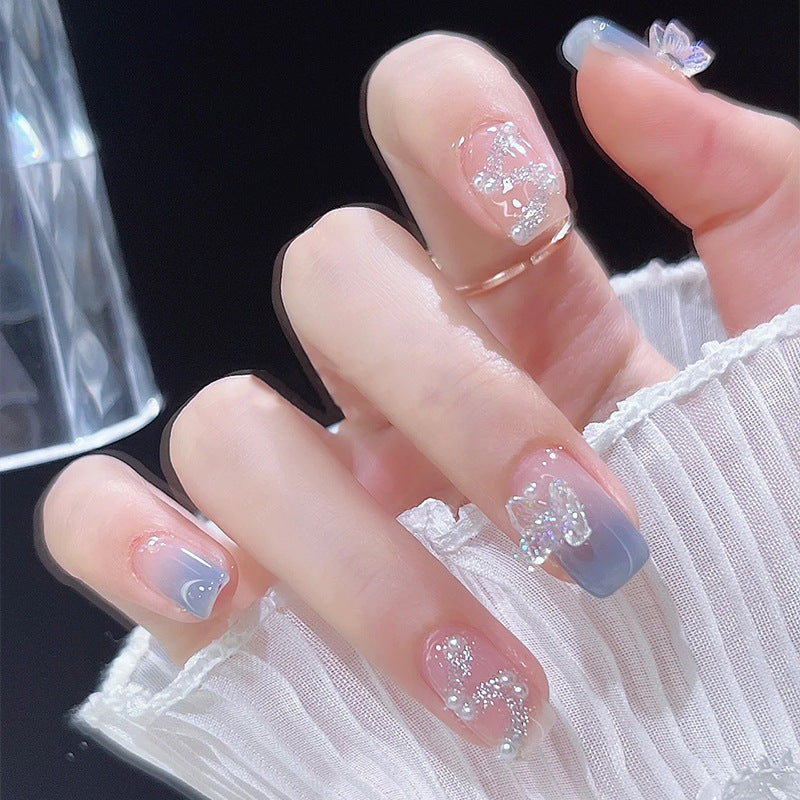 Acrylic nail set with sparkling glitter elements and appealing ombre design Acalora