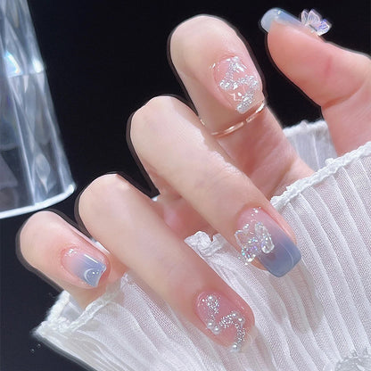 Acrylic nail set with sparkling glitter elements and appealing ombre design Acalora