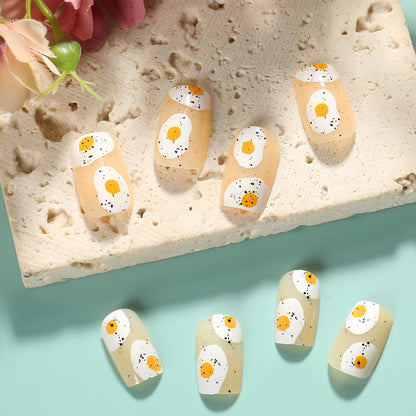 Artificial nails in creative fried egg design Acalora
