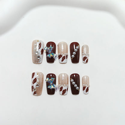 Artificial nails with glamorous 3D applications and glitter Acalora