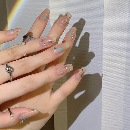 Acrylic nail set with sparkling star and glitter elements Acalora