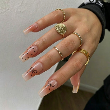 Artificial nails with modern dot design and elegant accents Acalora