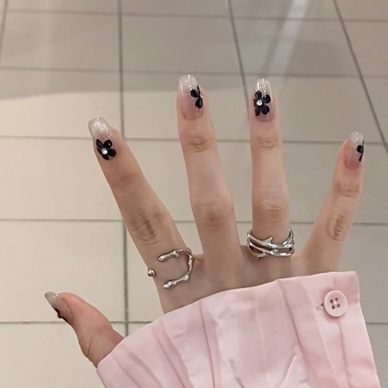 Artificial nail set with elegant flower design and glamorous accents Acalora