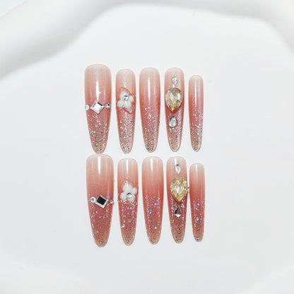 Artificial nail set with glitter and flower accents Acalora