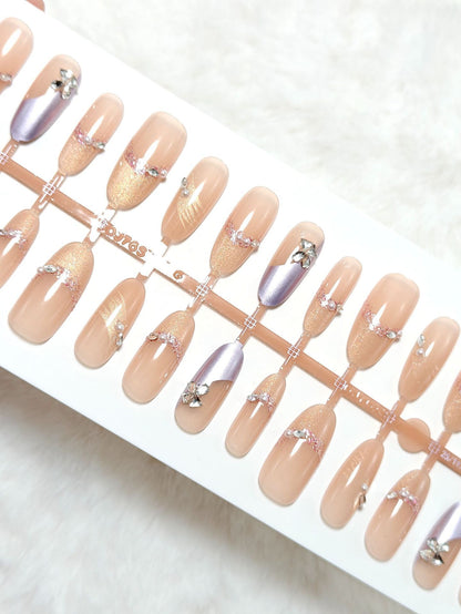 Artificial nails with modern glitter and stone embellishments Acalora