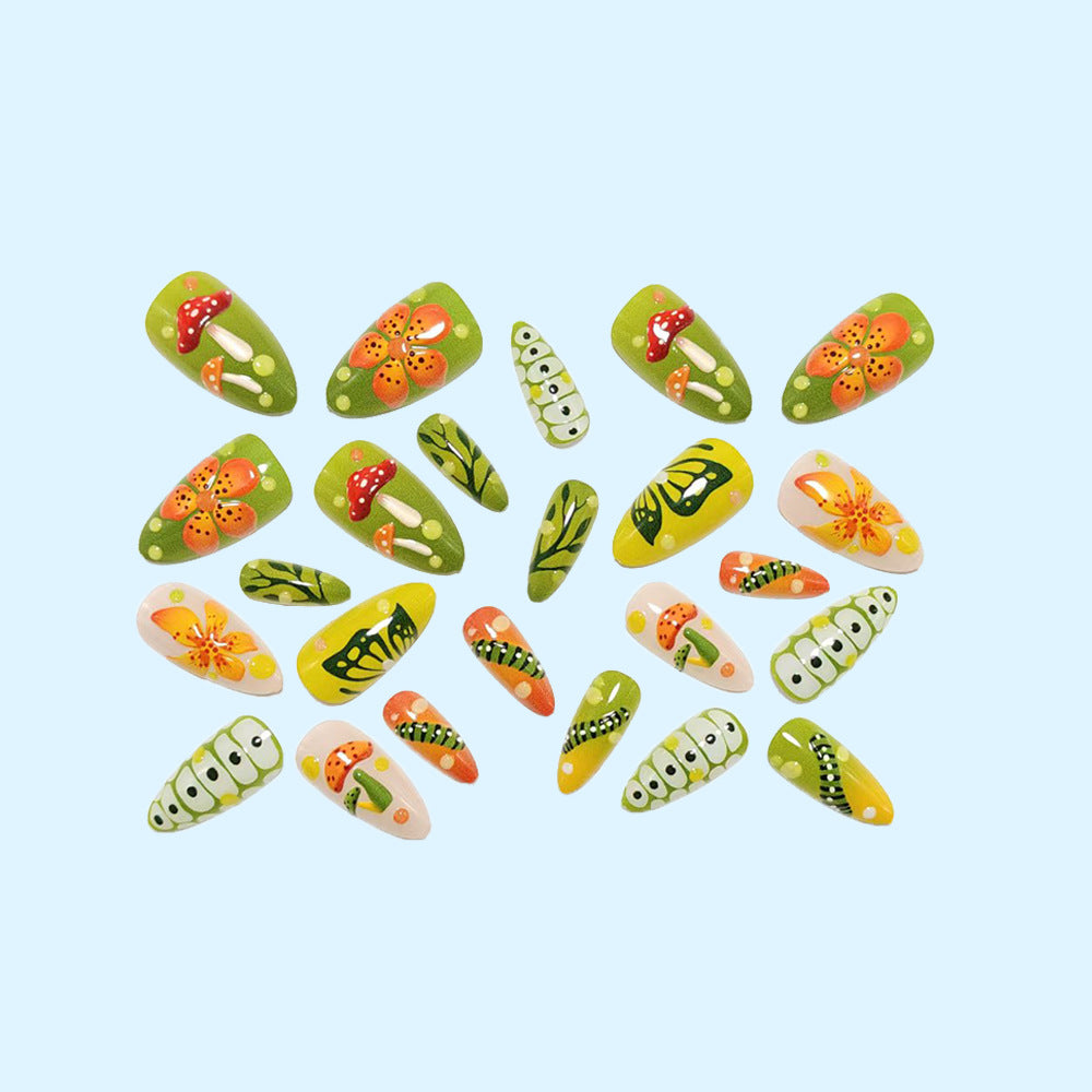 Artificial nails in forest style with floral and mushroom-shaped designs Acalora