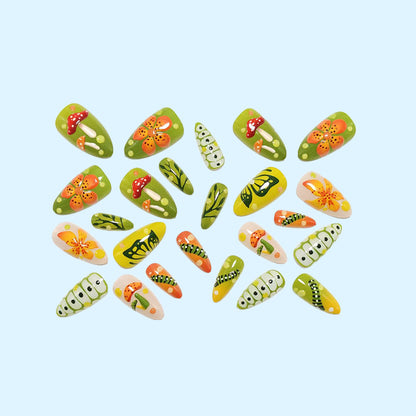Artificial nails in forest style with floral and mushroom-shaped designs Acalora