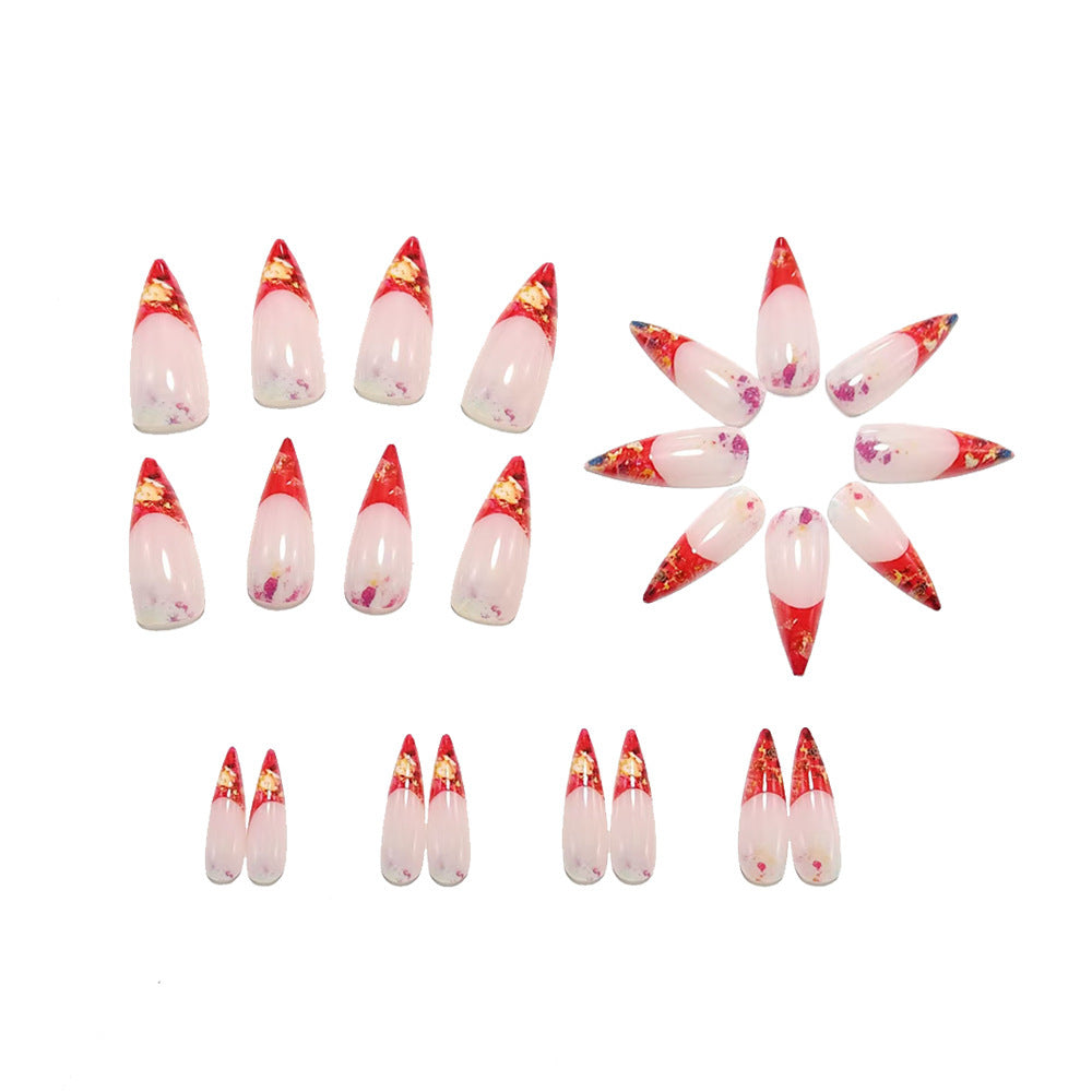 Nail art with sparkling design and extravagant pointed tips Acalora