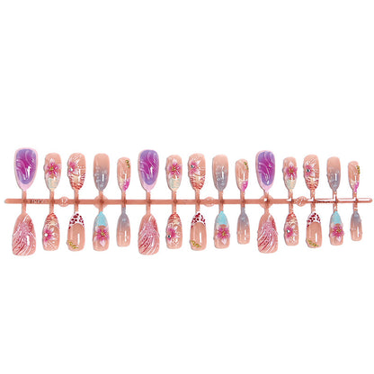 Artificial nail set with floral designs and glamorous accents Acalora