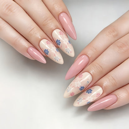 Stylish almond-shaped artificial nails with floral patterns Acalora