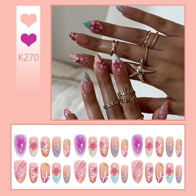 Artificial nail set with floral designs and glamorous accents Acalora