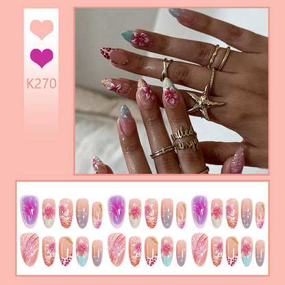 Artificial nail set with floral designs and glamorous accents Acalora