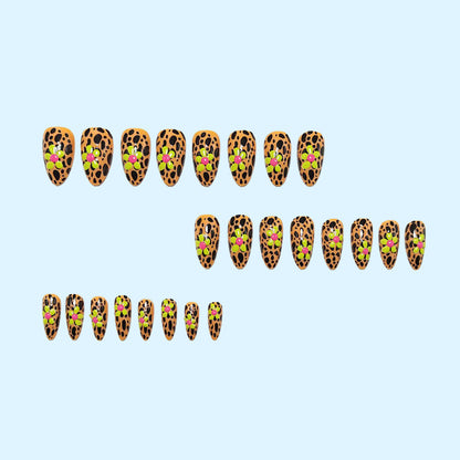 Artificial nails in modern animal patterns with floral accents Acalora