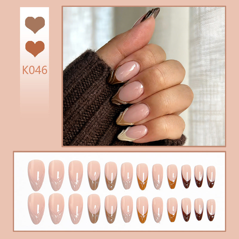 Acrylic nail set with elegant marble pattern and glossy finish Acalora