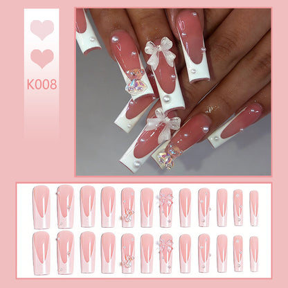 Artificial nail set with elegant bow and pearl decorations Acalora
