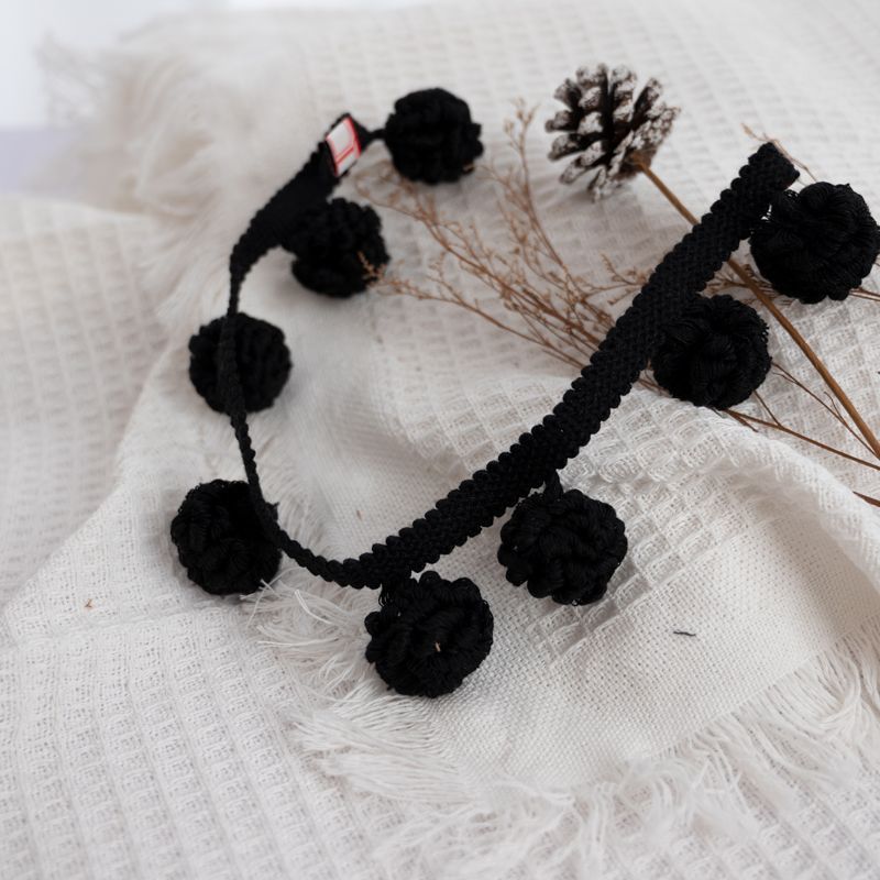 Decorative border with pompons Acalora