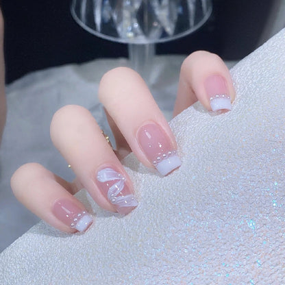 Elegant artificial nail set with stylish wave pattern and pearl accents Acalora