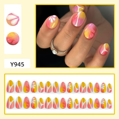 Artificial nails with floral design and elegant color gradients Acalora