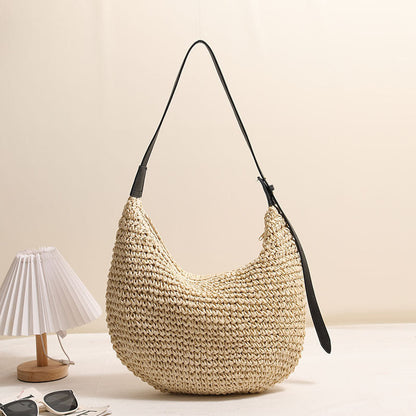 Women's Handmade Shoulder Bag made of braided natural material with a narrow leather strap Karnz