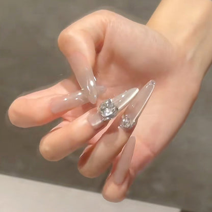 Acrylic nail set with glitter design and elegant 3D applications Acalora