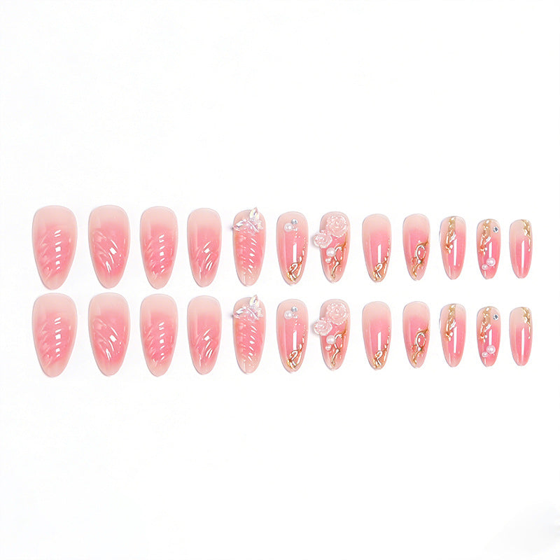 Artificial nail creation with floral 3D details and glitter accents Acalora