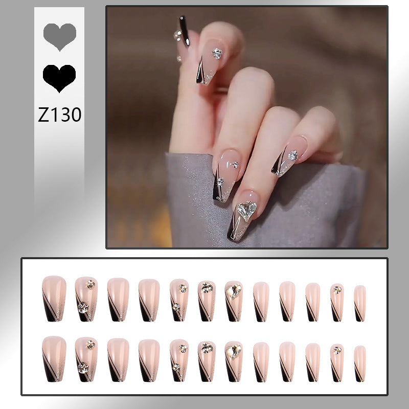 Nail art set with elegant wave patterns and delicate pearl accents Acalora