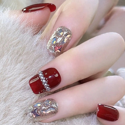 Glamorous artificial nail set with sparkling 3D applications and elegant embellishments Acalora