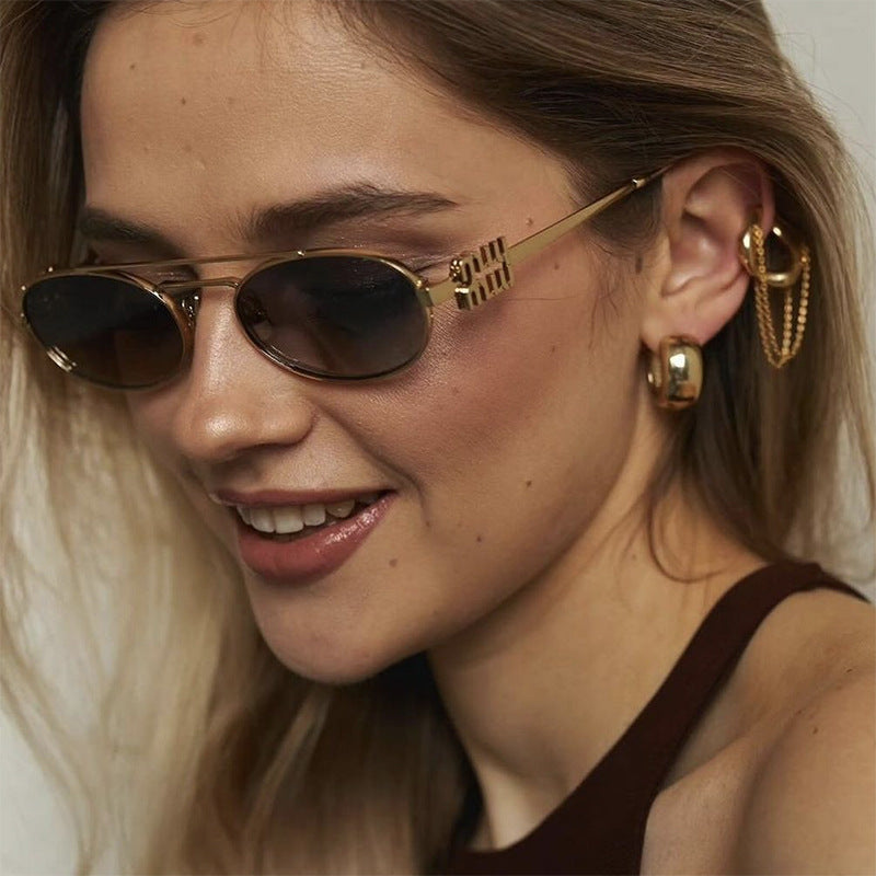 Women's elegant oval sunglasses with luxurious metal frame Karnz