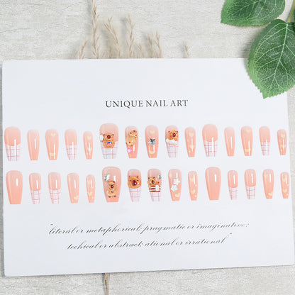 Artificial nail set with charming animal design and sparkling crystal embellishments Acalora